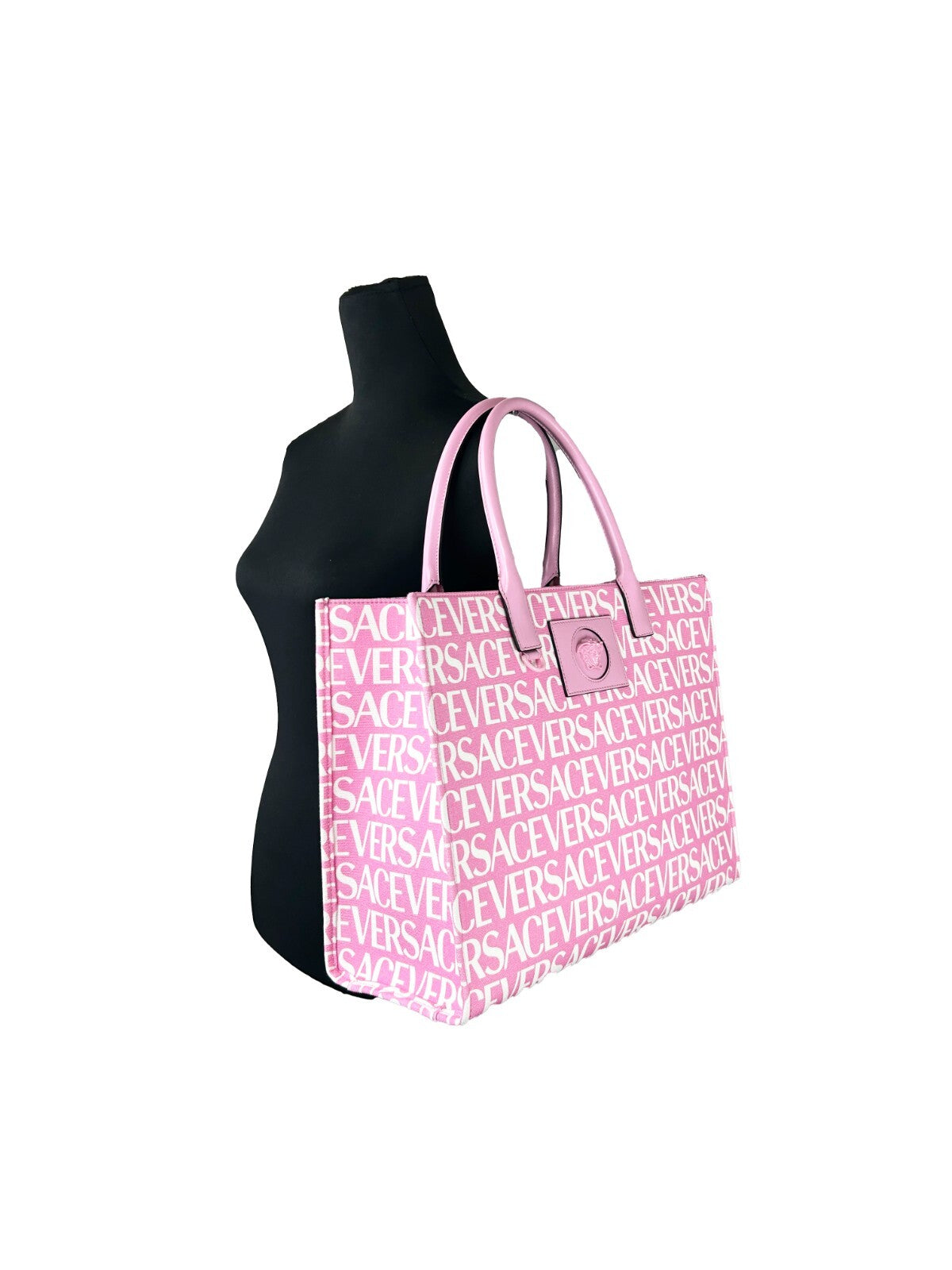 Elevate your style with the Versace Medusa Large Canvas Tote Bag, a blend of premium baby pink canvas and leather trim, meticulously crafted in Italy for the discerning individual.