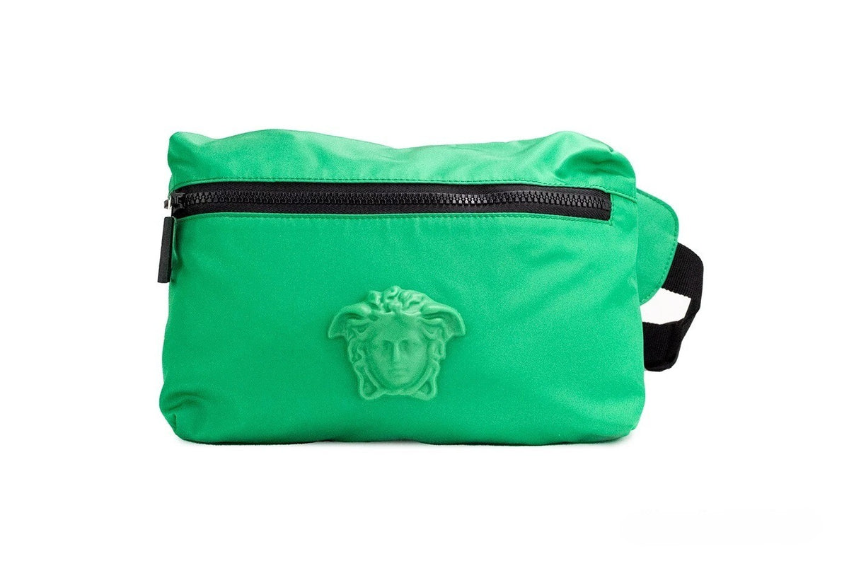 Elevate your style with the Versace Small Bright Green Nylon Matte Medusa Belt Bag, a luxurious fusion of vibrant design and impeccable craftsmanship for the discerning individual.