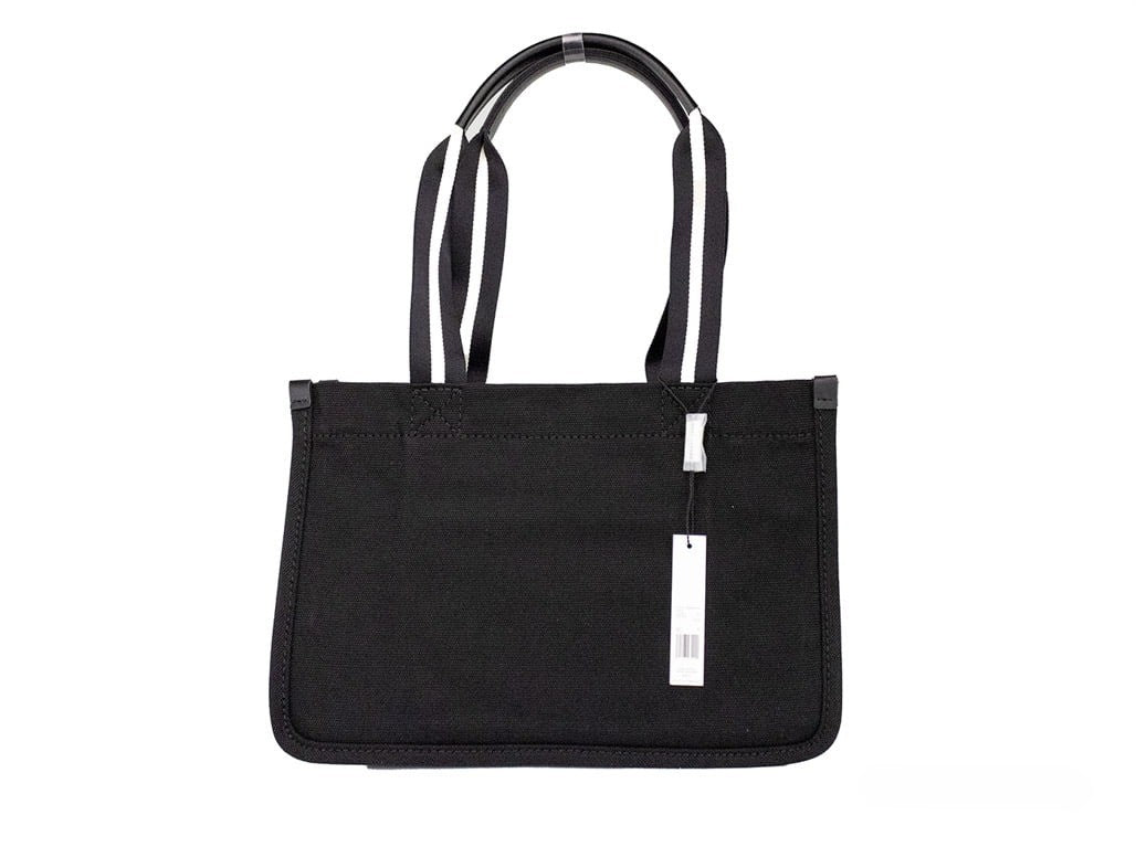 Indulge in the elegance of the Marc Jacobs Medium Black Canvas Fabric Tote, a perfect blend of sophistication and practicality for the discerning individual.