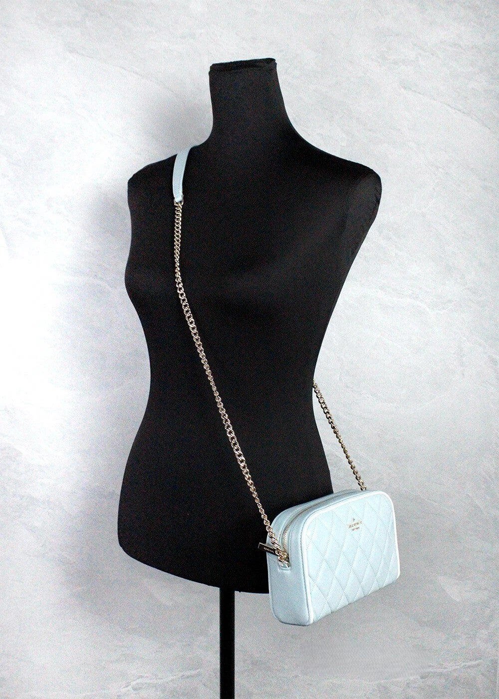 Discover the Kate Spade Carey Mini Wild Sage Quilted Leather Camera Crossbody Bag, a masterpiece of luxurious craftsmanship that elevates your style for any occasion.