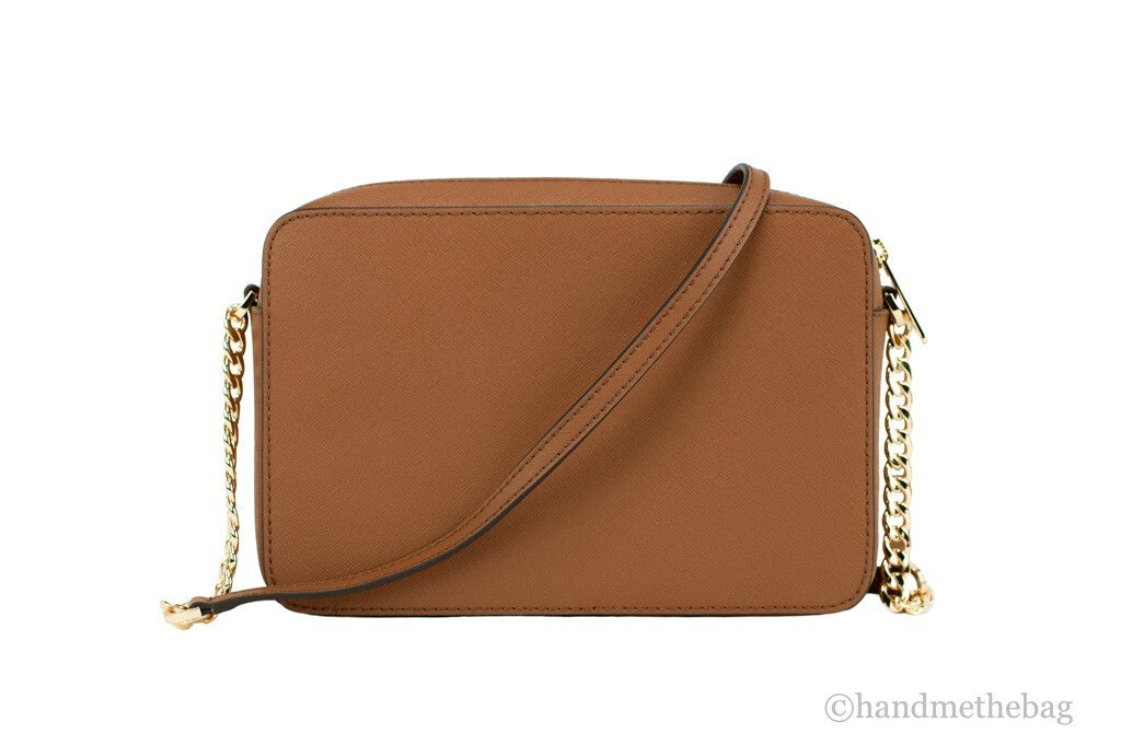 Elevate your style with the Michael Kors Saffiano Leather Crossbody Bag, a masterpiece of craftsmanship that embodies luxury and sophistication for every occasion.