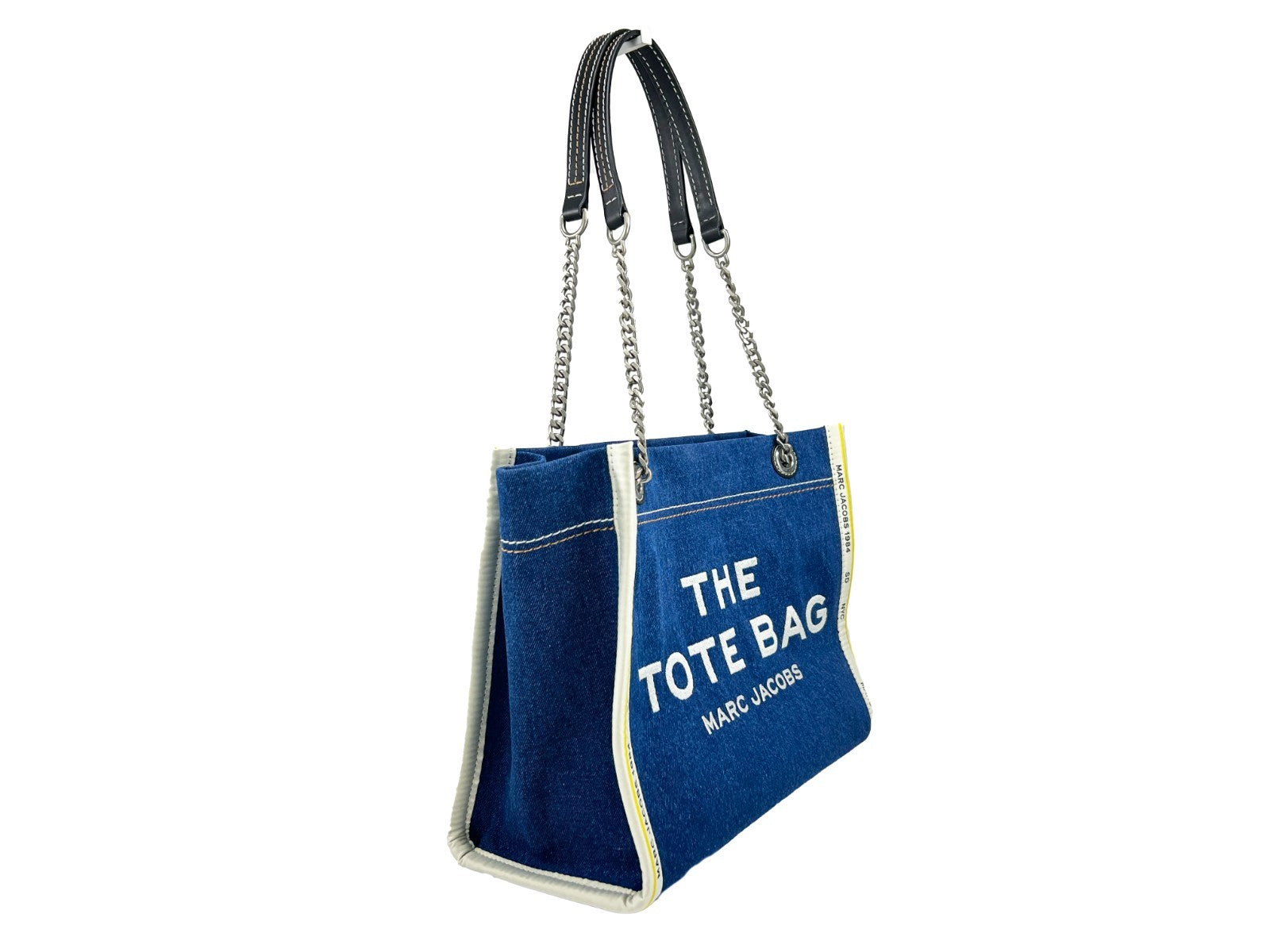 Elevate your style with the Marc Jacobs Denim Chain Medium Tote Bag, a luxurious blend of urban sophistication and timeless elegance, perfect for discerning individuals.