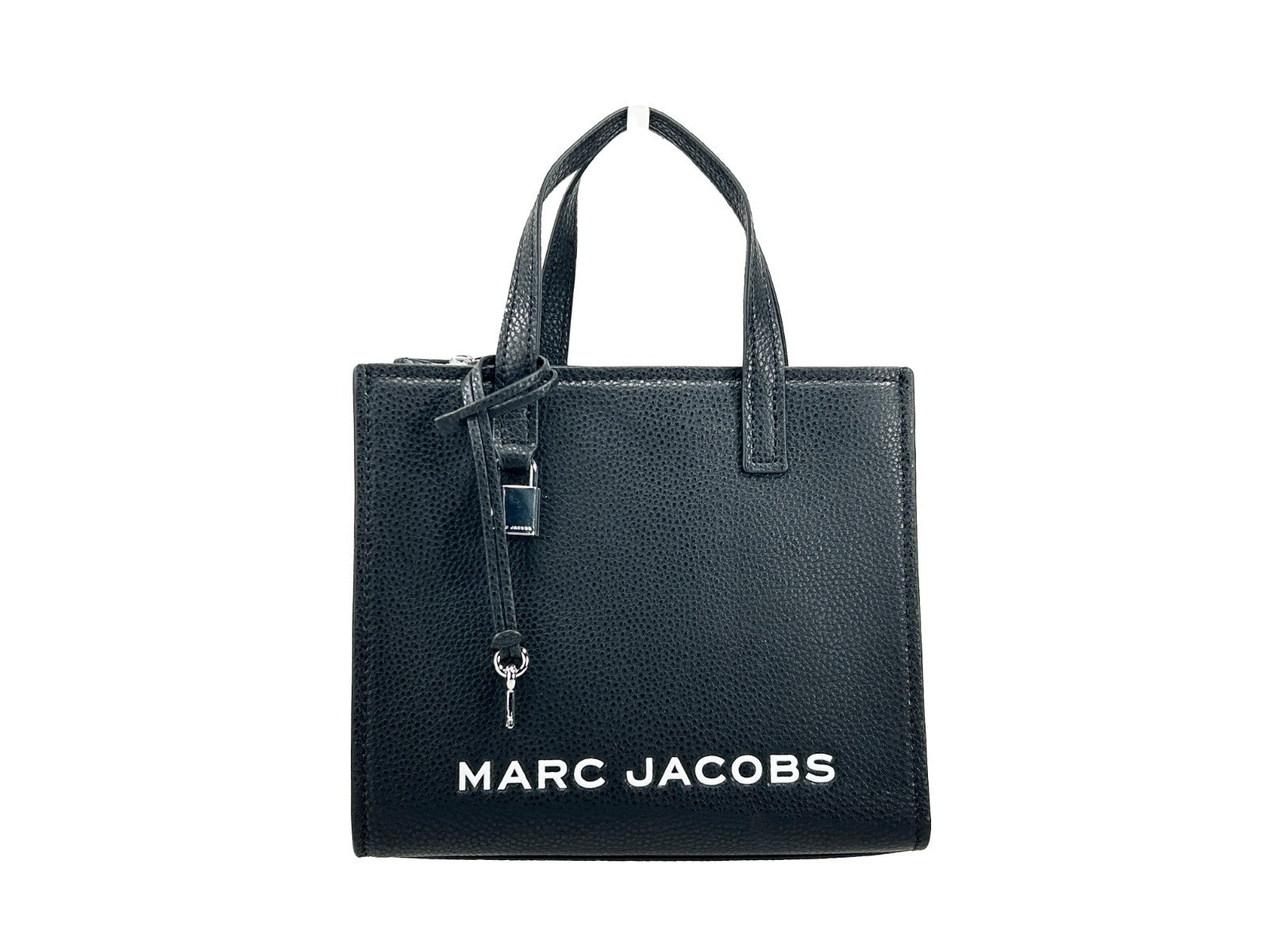 Discover the Marc Jacobs Mini Grind Black Leather Crossbody Bag, a symbol of artisanal luxury crafted from exquisite pebbled leather, perfect for the discerning individual.