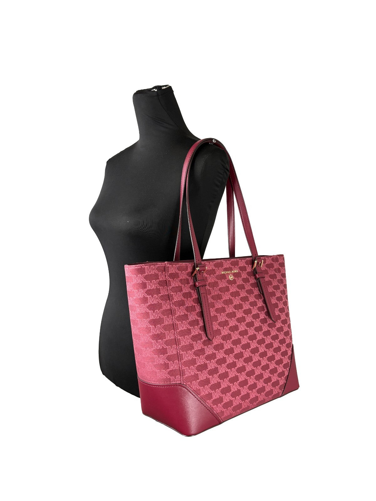Experience the epitome of sophistication with the Michael Kors Aria Large Tote Bag, a luxurious blend of canvas and leather, designed for the discerning individual.