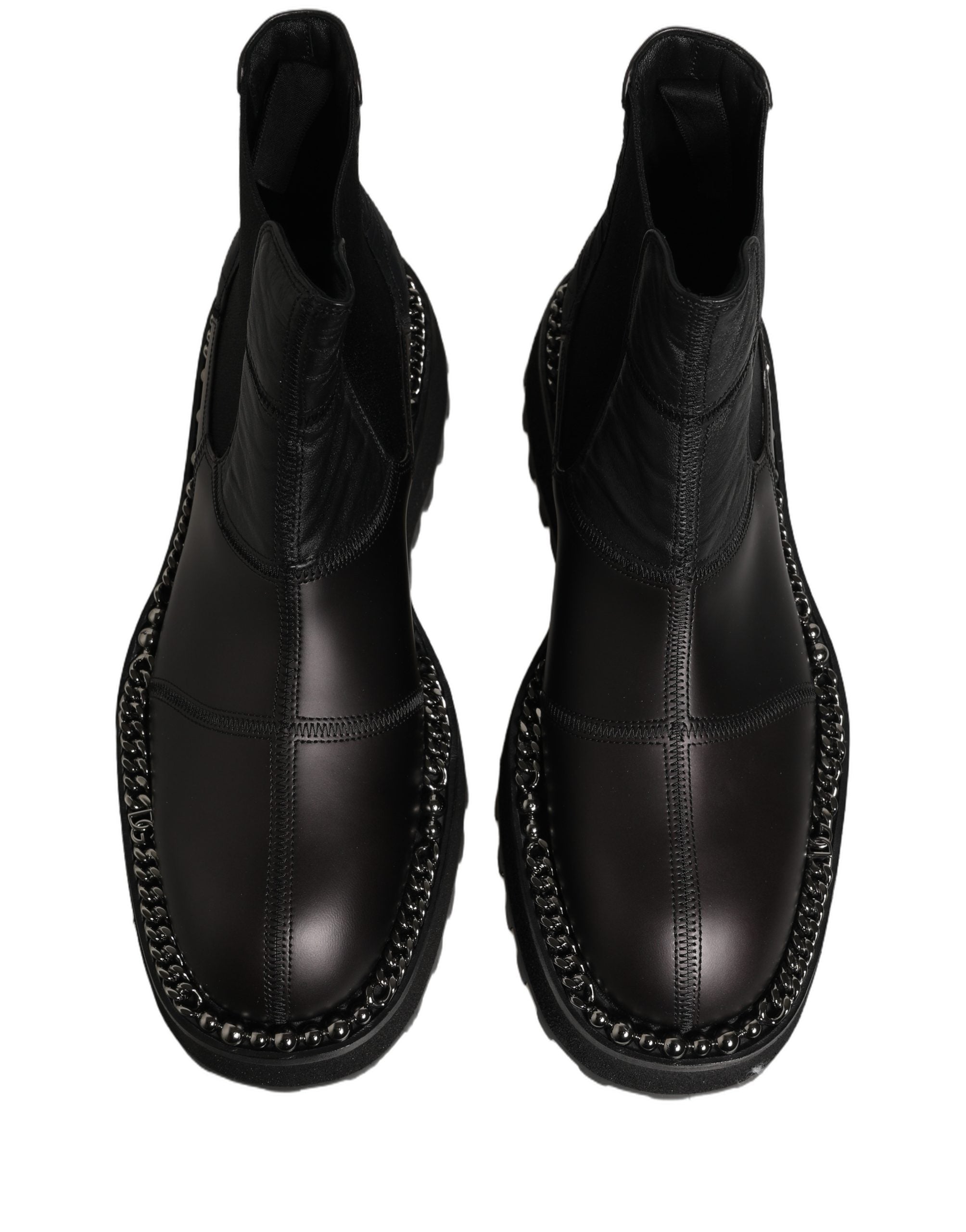 Step into sophistication with Dolce & Gabbana's Black Chelsea Boots, crafted from luxurious lamb leather and exquisite materials, embodying timeless elegance for the discerning individual.