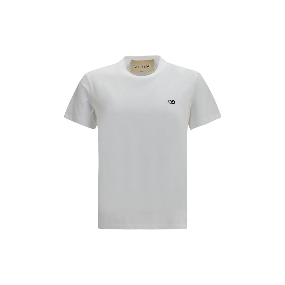 Elevate your wardrobe with the Valentino White Cotton T-Shirt, a masterpiece of 100% cotton craftsmanship, embodying timeless elegance and effortless sophistication.