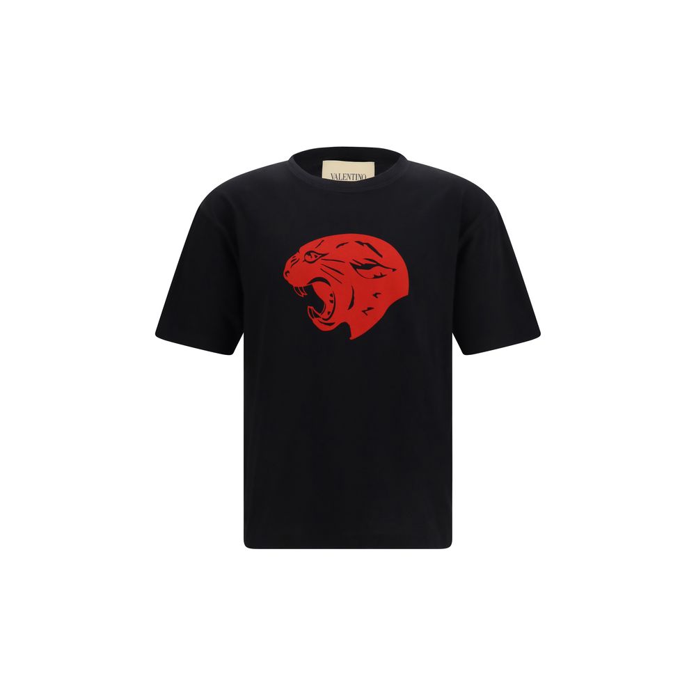 Indulge in the Valentino Black Cotton T-Shirt, a masterpiece of 100% cotton featuring a striking Panther print, elevating your wardrobe with luxury and sophistication.