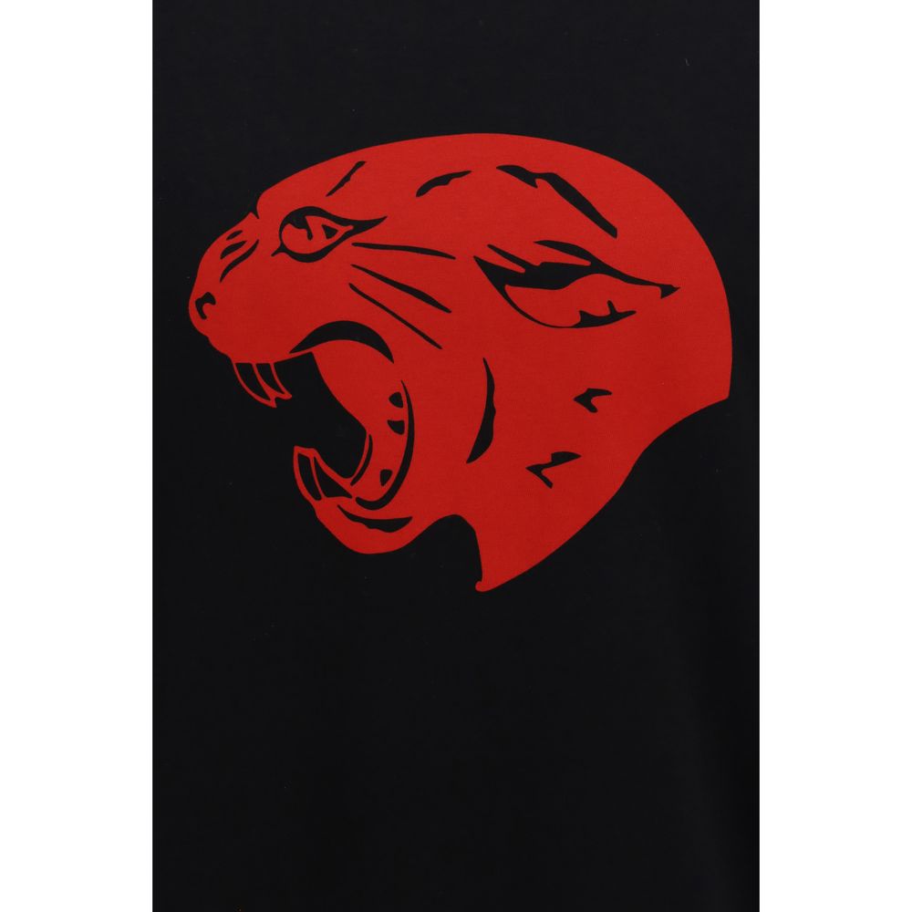 Indulge in the Valentino Black Cotton T-Shirt, a luxurious staple crafted from 100% cotton, featuring a striking Panther print that elevates your style with sophistication.