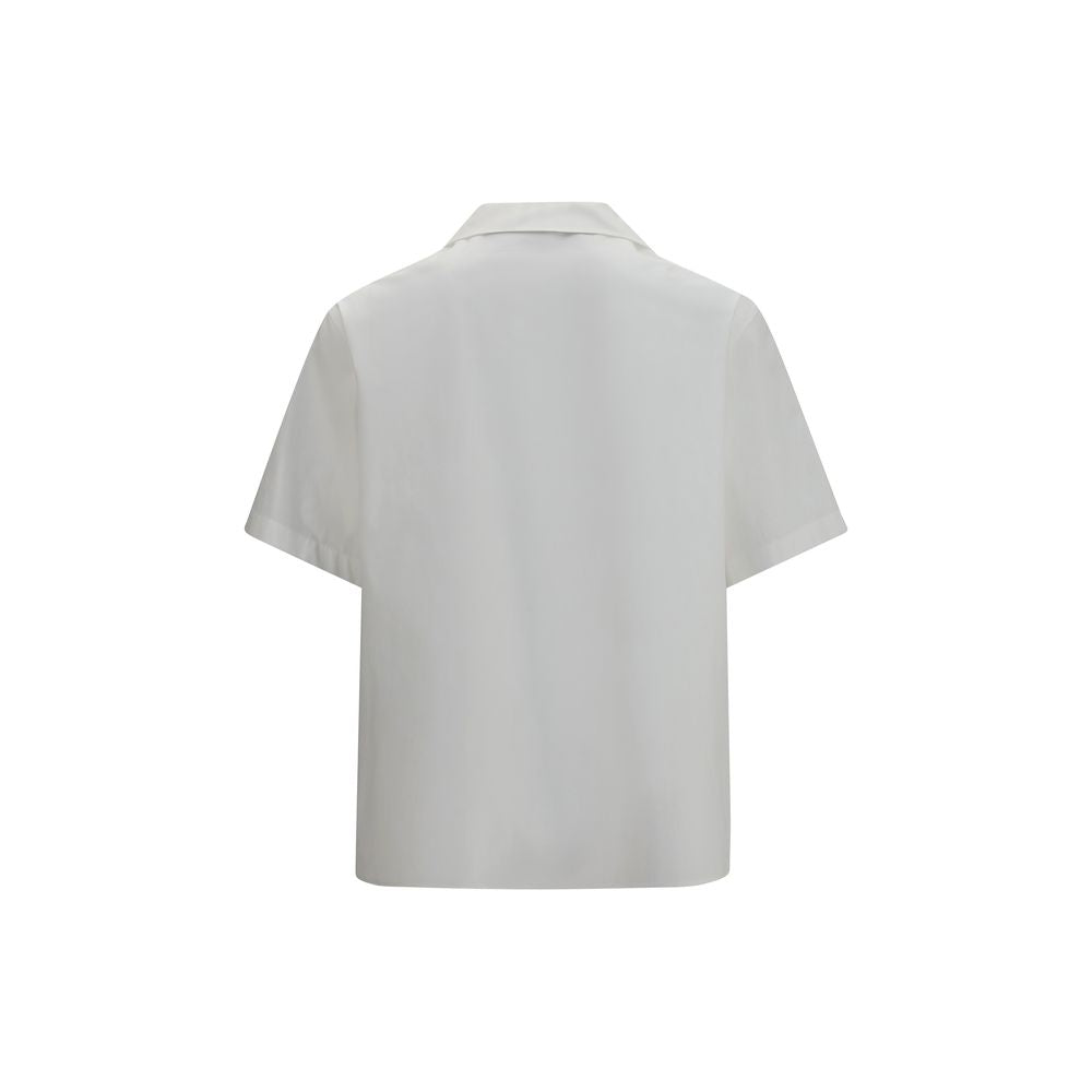 Experience the allure of the Valentino White Cotton Shortsleeve Shirt, a masterpiece of 100% cotton elegance from the AW26 collection, embodying refined luxury and timeless sophistication.