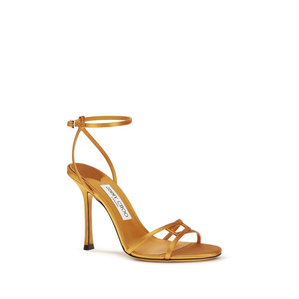 Elevate your elegance with Jimmy Choo's Orange Silk Stiletto Heel Sandals, a timeless masterpiece crafted from 100% silk, perfect for unforgettable occasions.