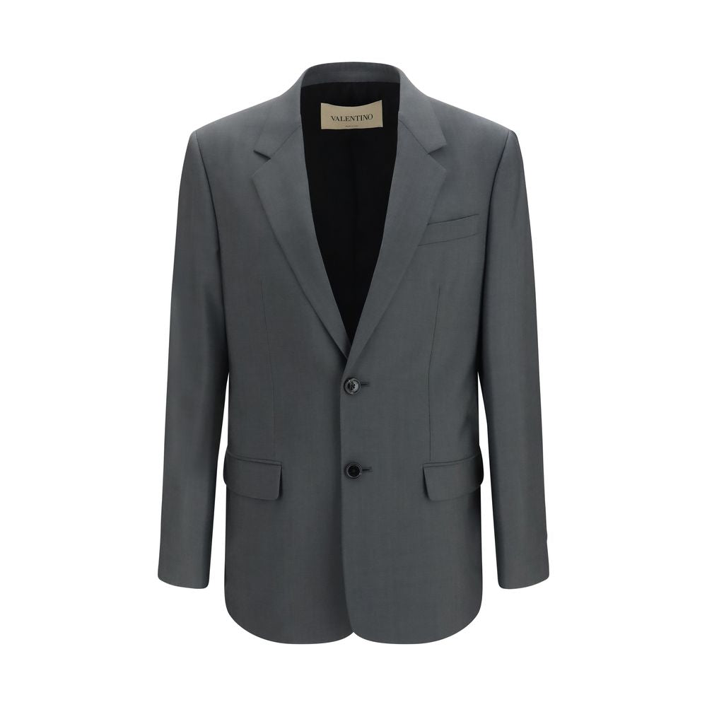 Discover the Valentino Gray Wool Oves Aries Jacket, a masterpiece of 84% Merino Wool and 16% Mohair, embodying timeless elegance and refined craftsmanship for the discerning individual.