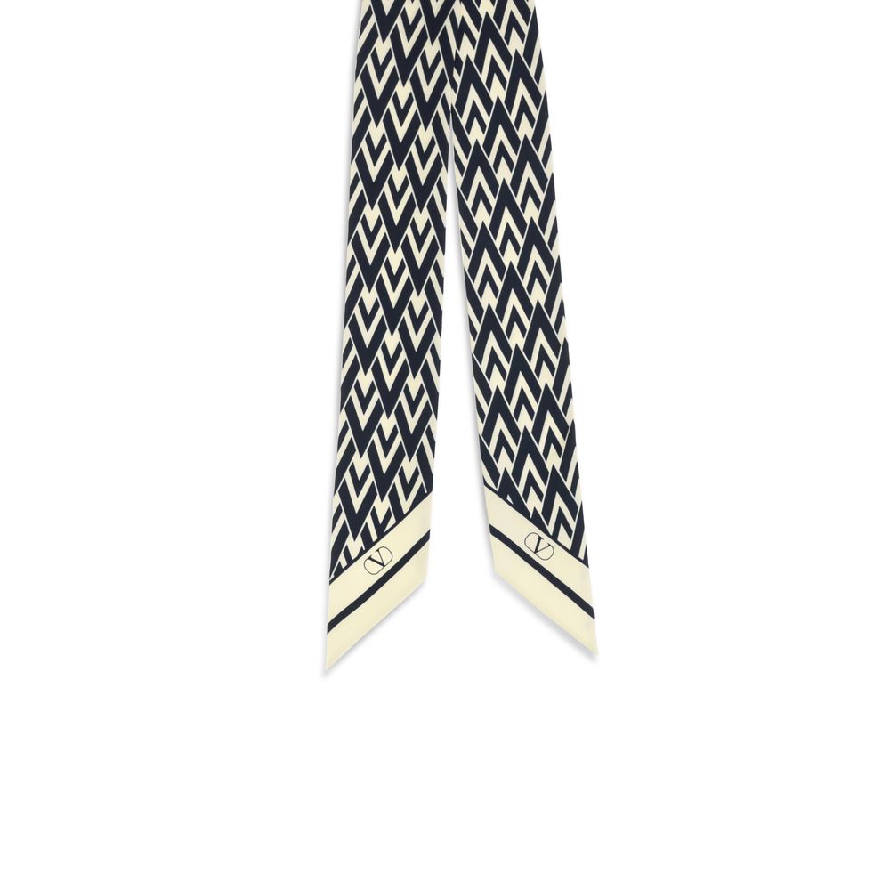 Indulge in the exquisite Valentino Garavani Blue Silk Scarf from the AW26 collection, a masterpiece of 100% silk that redefines elegance and sophistication for every discerning individual.