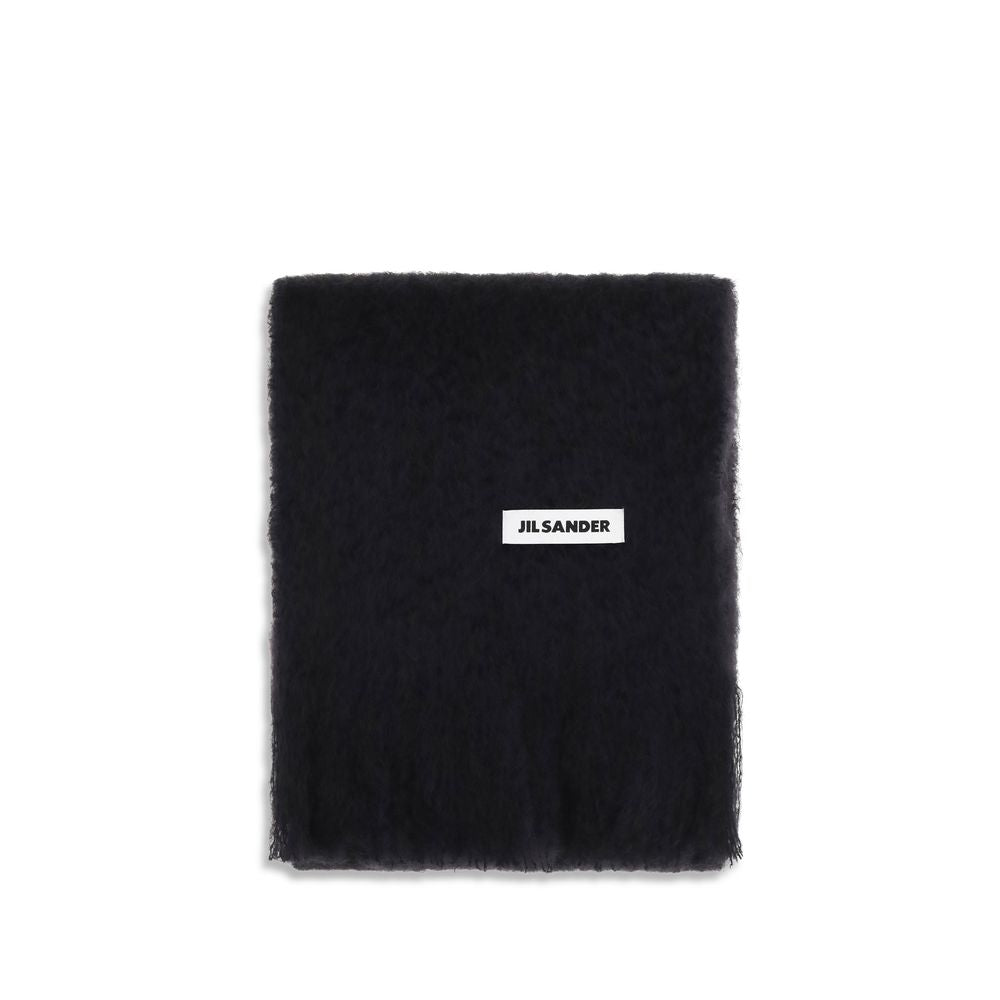 Indulge in the Jil Sander Black Wool Oves Aries Scarf, a timeless luxury accessory crafted from 100% Wool Ovis Aries, embodying elegance and sophistication for discerning tastes.