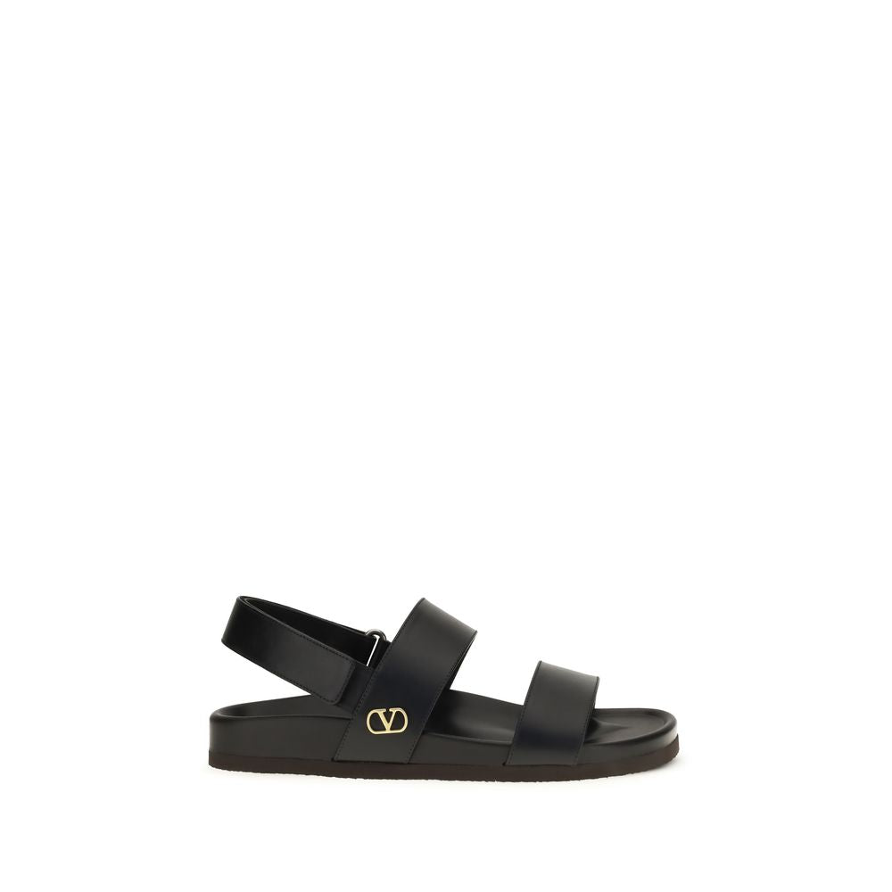 Valentino Garavani Black Calf Leather Flat Sandals for Elegance