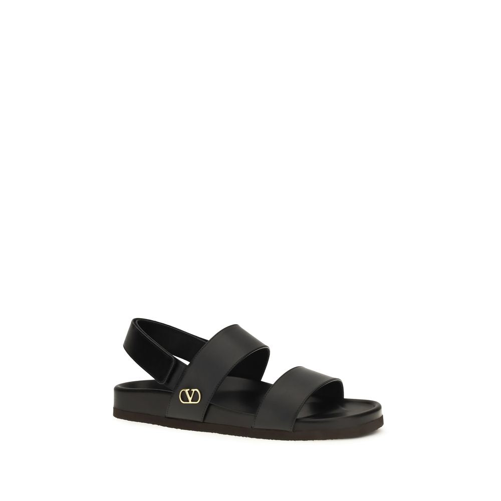 Valentino Garavani Flat Sandals in Black Calf Leather for Elegance