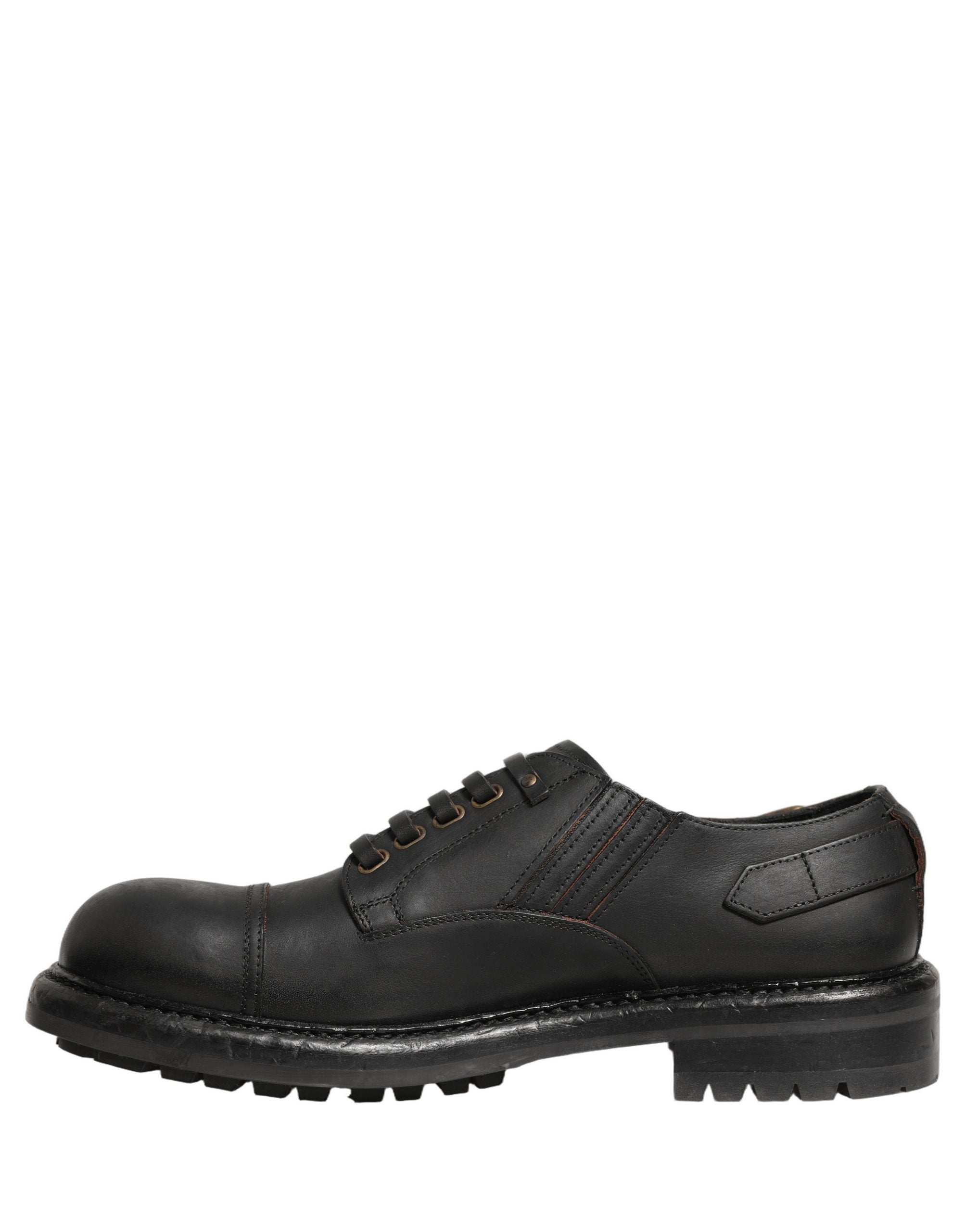 Elevate your style with Dolce & Gabbana's exquisite black leather Derby shoes, a timeless blend of luxury craftsmanship and modern elegance, perfect for any distinguished occasion.