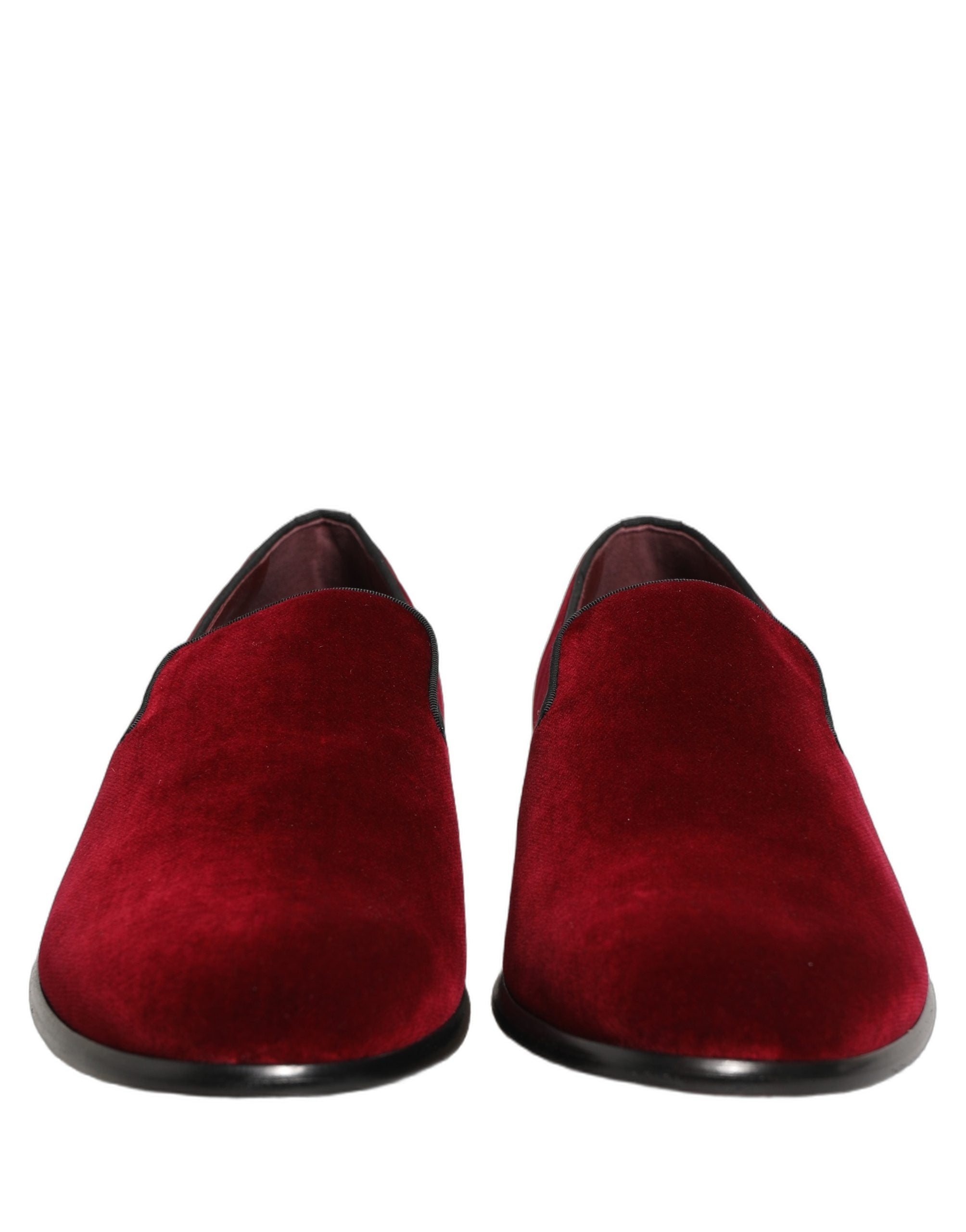 Elevate your style with Dolce & Gabbana's Maroon Velvet Slip On Loafers, where Italian craftsmanship meets luxurious comfort, perfect for the discerning connoisseur.