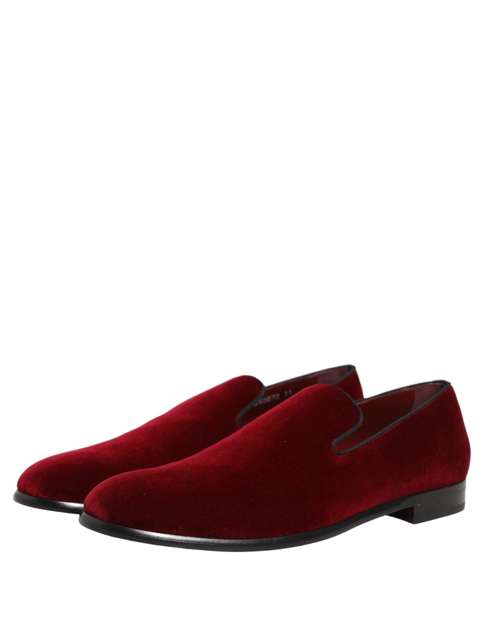 Elevate your style with Dolce & Gabbana's Maroon Velvet Slip On Loafers, where Italian craftsmanship meets luxurious comfort, perfect for the discerning connoisseur.