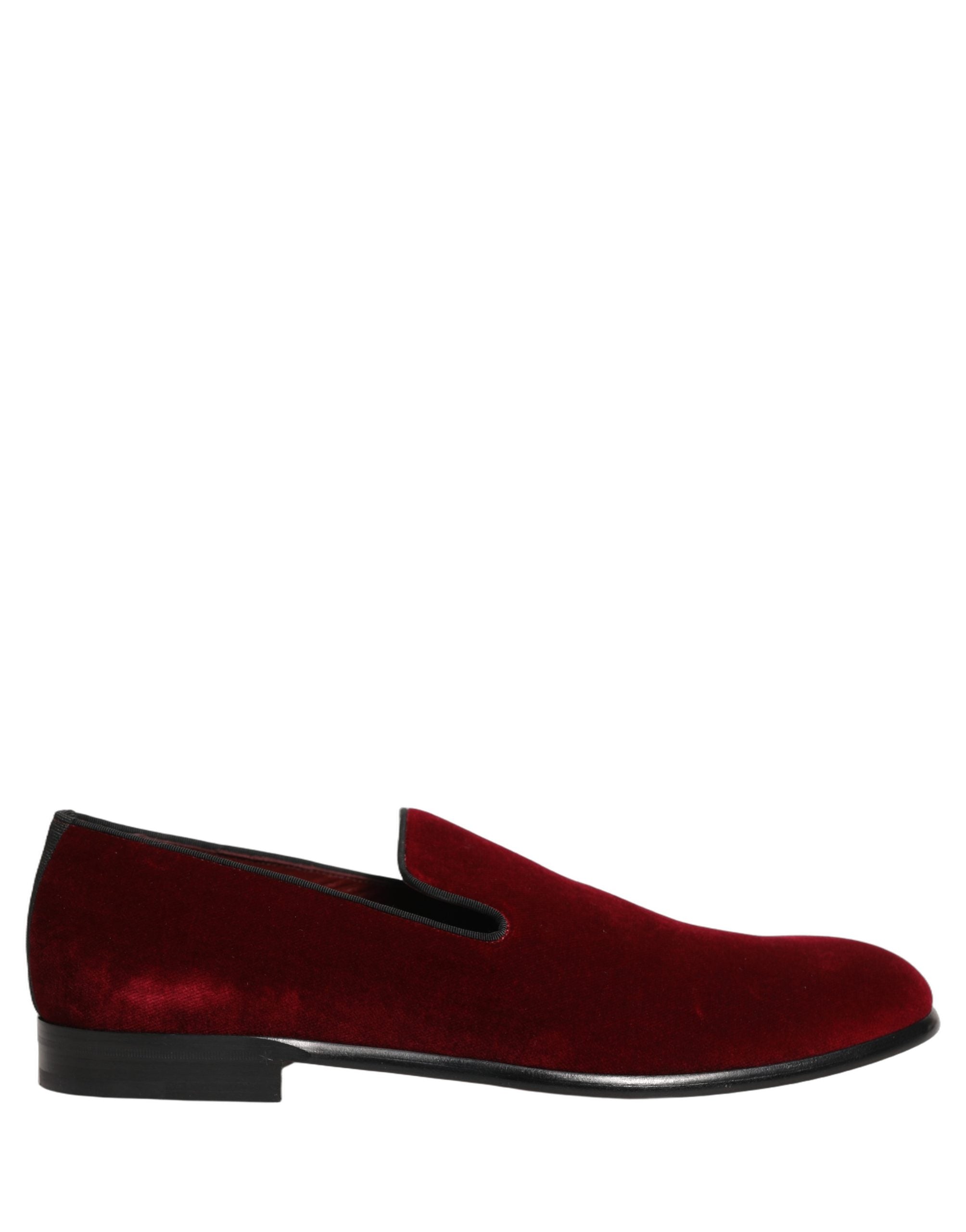 Indulge in the exquisite Dolce & Gabbana Maroon Velvet Slip On Men Dress Loafers, where Italian craftsmanship meets luxurious comfort, perfect for the discerning connoisseur.
