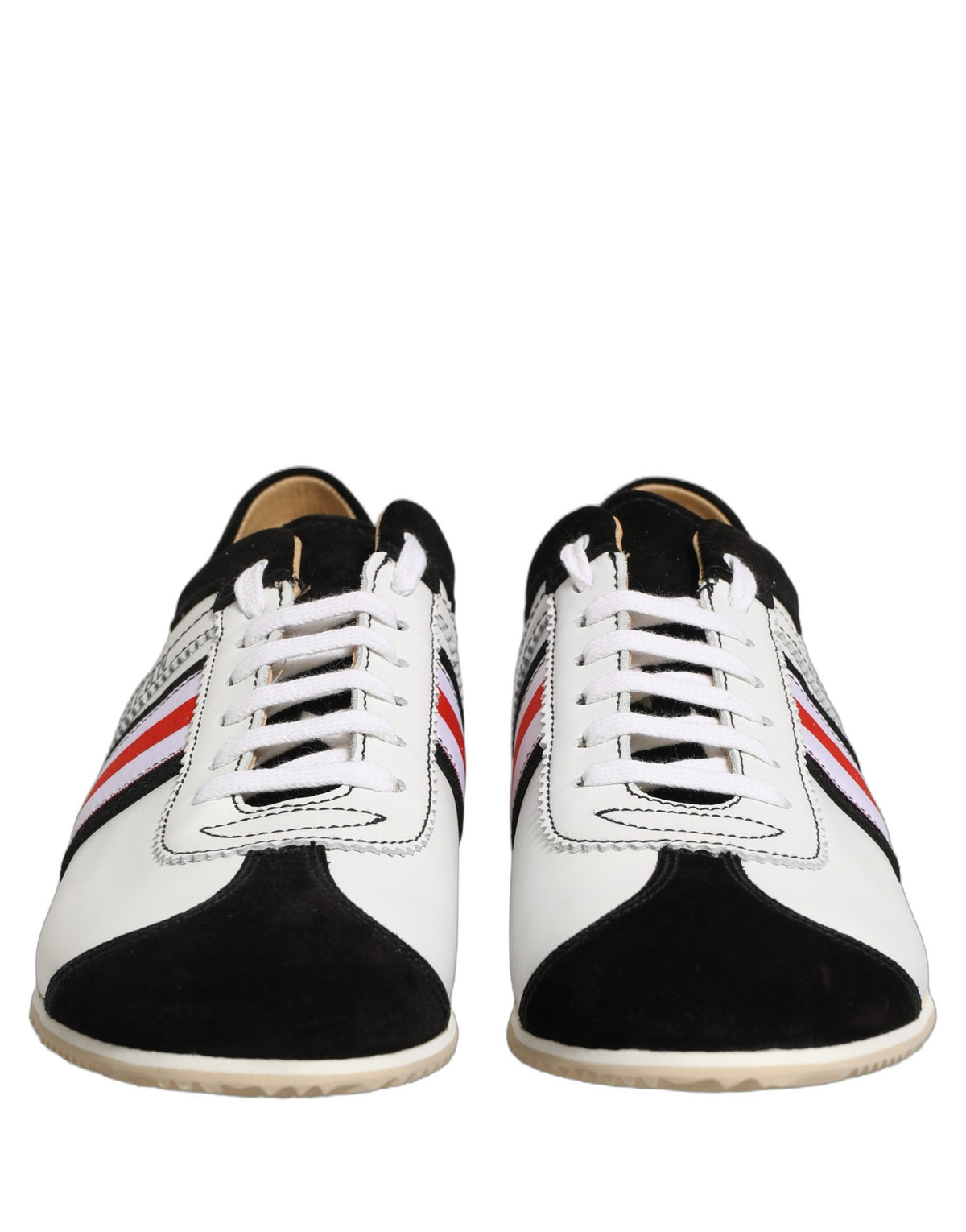 Indulge in the exquisite Dolce & Gabbana Black White Leather Suede Low Top Sneakers, a testament to Italian craftsmanship and luxury, elevating your style with every step.