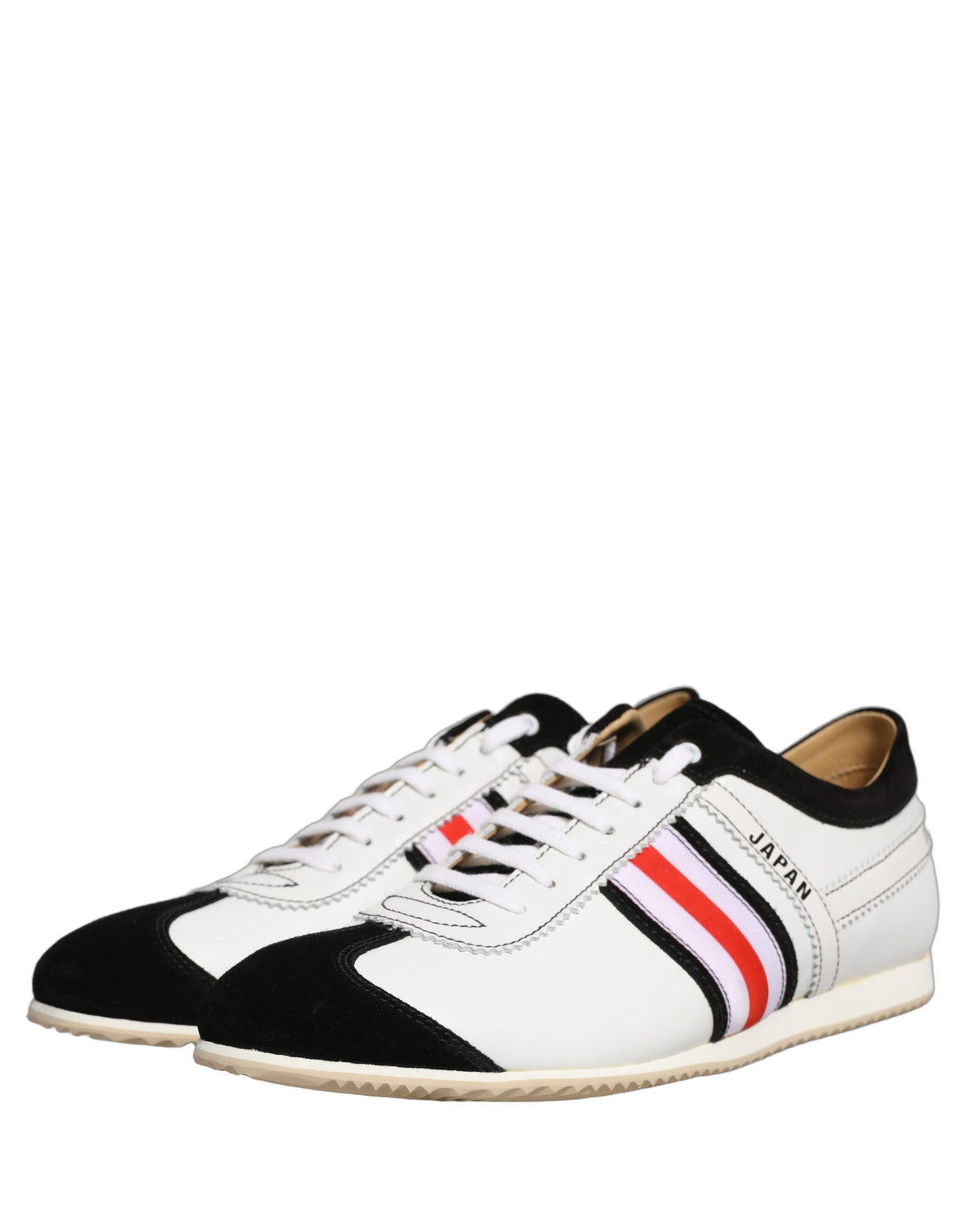 Indulge in the exquisite Dolce & Gabbana Black White Leather Suede Low Top Sneakers, a testament to Italian craftsmanship that elevates your style with luxurious sophistication.
