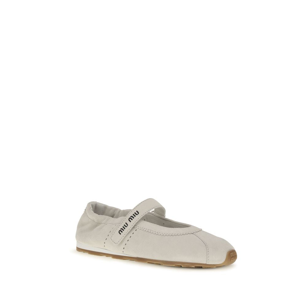 Experience the exquisite allure of Miu Miu's White Calf Leather Bos Taurus Ballet Flats, where sumptuous suede and refined craftsmanship elevate your style to new heights.