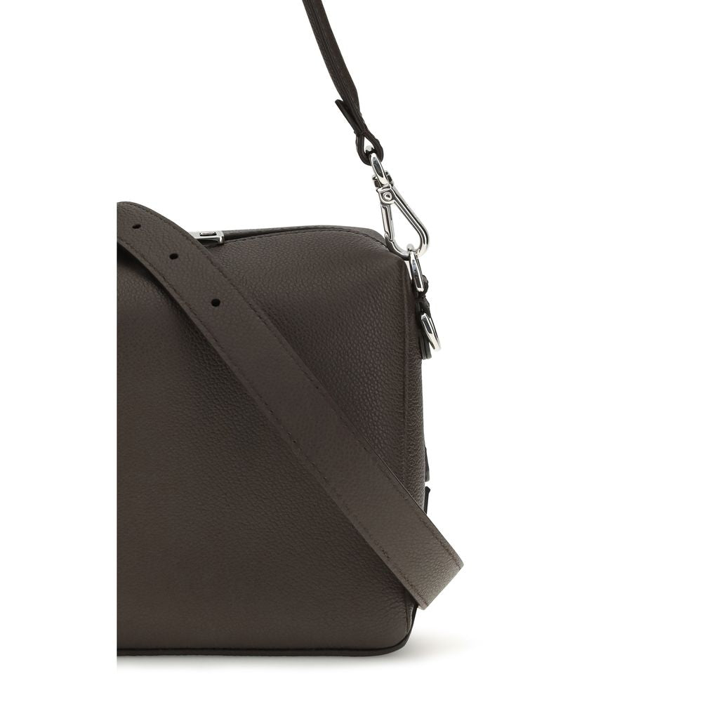 Elevate your style with the Fendi Brown Calf Leather Bos Taurus Shoulder Bag, a masterpiece of Italian craftsmanship that embodies timeless elegance and sophistication.