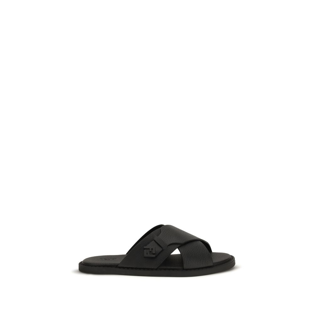 Experience the allure of Fendi's Black Calf Leather Bos Taurus Flat Sandals, where exquisite craftsmanship meets luxurious comfort for the discerning connoisseur.