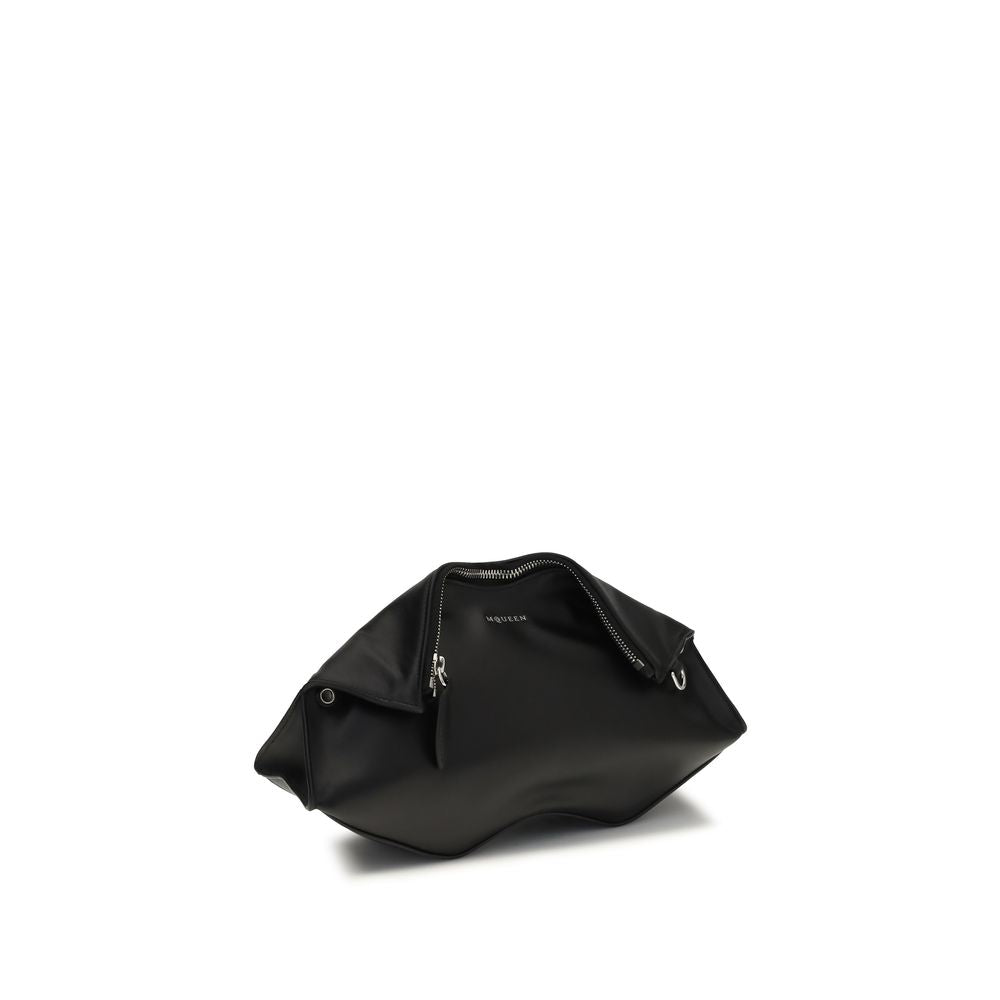 Discover the Alexander McQueen Black Calf Leather Bos Taurus Clutch Bag, a masterpiece of elevated craftsmanship and timeless elegance, perfect for any refined wardrobe.