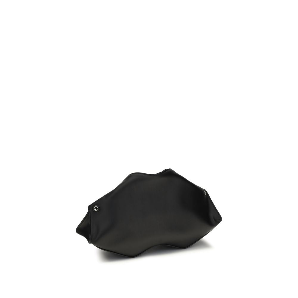 Indulge in the exquisite Alexander McQueen Black Calf Leather Bos Taurus Clutch Bag, a masterpiece of craftsmanship that redefines luxury and elegance for any occasion.