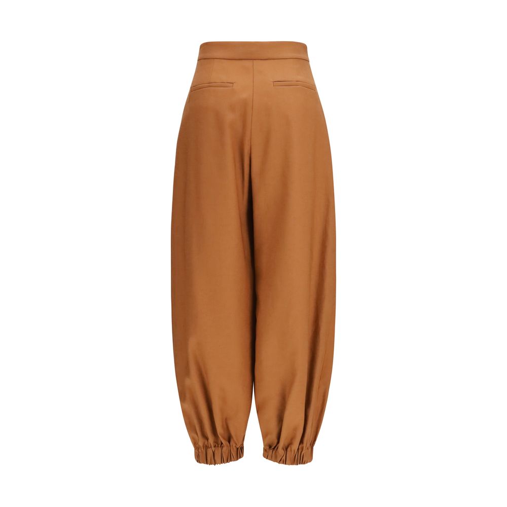 Elevate your wardrobe with Fendi Brown Linen Casual Pants, a luxurious blend of 71% linen and 29% cotton, designed for effortless sophistication and timeless elegance.