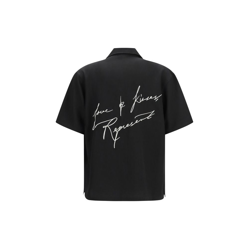 Elevate your style with the Represent Black Lyocell Pattern Shirt, a masterpiece of contemporary design crafted from luxurious 100% Lyocell for effortless sophistication.