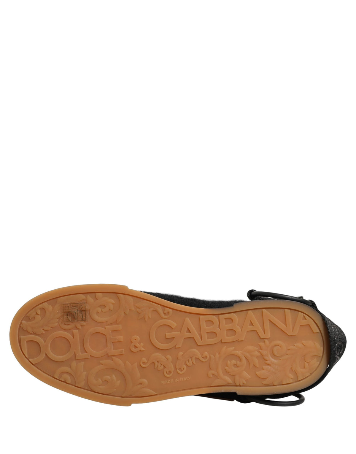 Elevate your style with Dolce & Gabbana's Black Leather Low Trainers, where exquisite Italian craftsmanship meets luxurious versatility for every occasion.