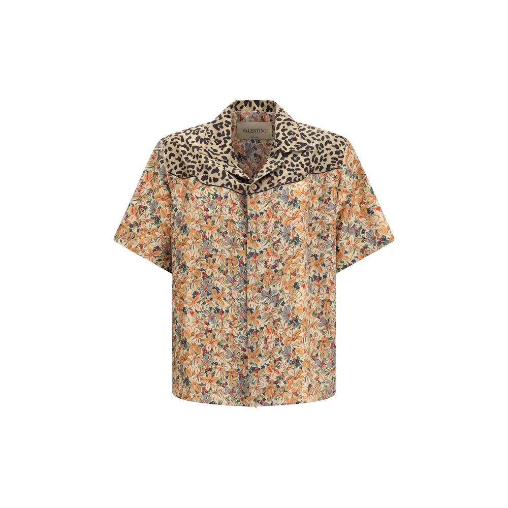 Elevate your wardrobe with the Valentino Multicolor Silk Pattern Shirt, a luxurious blend of artistry and sophistication, crafted from 100% silk for timeless elegance.