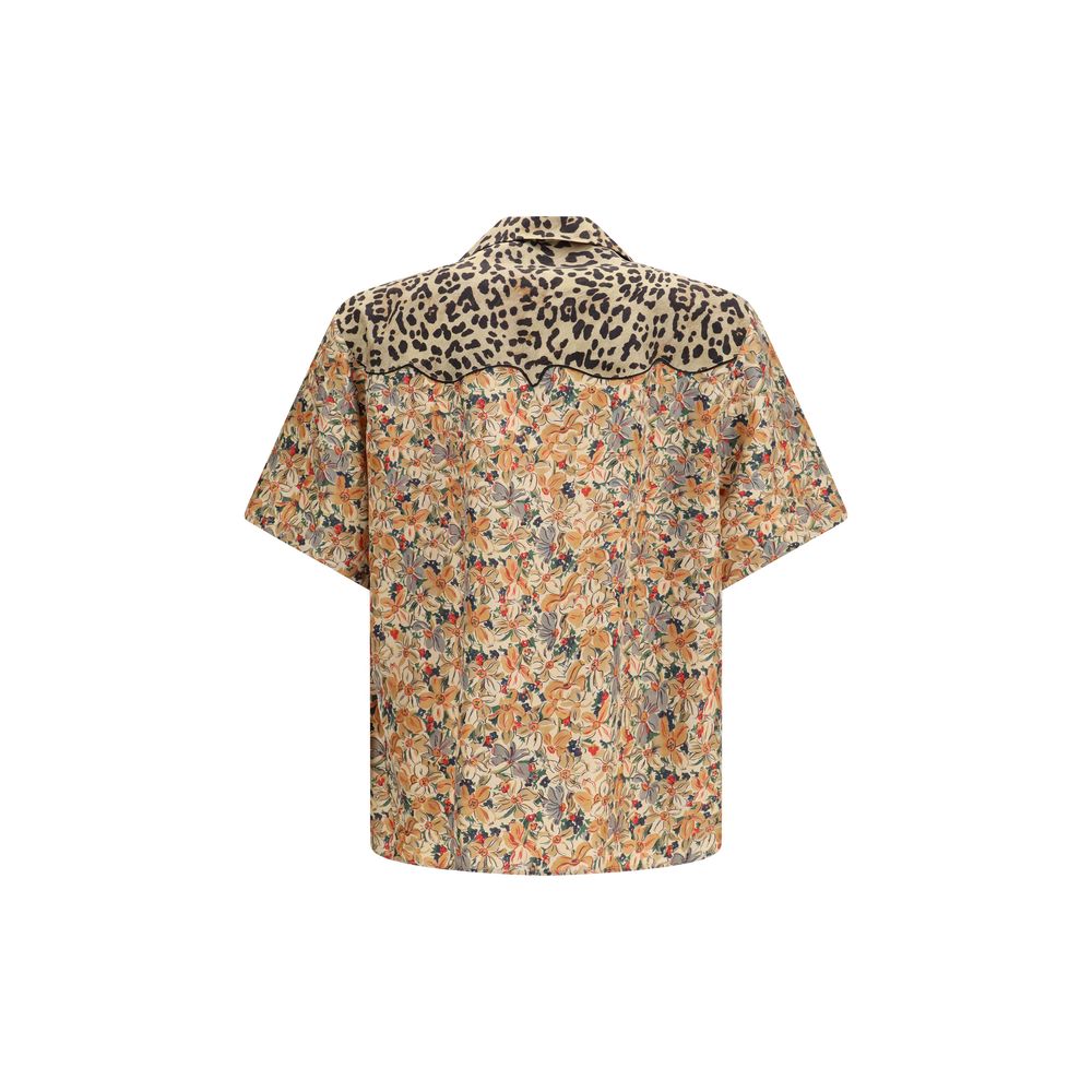 Indulge in the Valentino Multicolor Silk Pattern Shirt, a luxurious blend of artistry and sophistication crafted from 100% silk, perfect for the discerning fashion connoisseur.