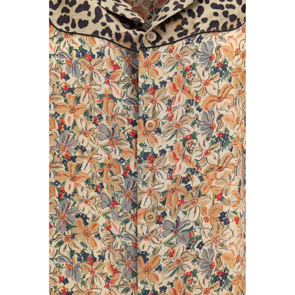 Elevate your wardrobe with the Valentino Multicolor Silk Pattern Shirt, a masterpiece of 100% silk artistry, blending bold prints for the discerning fashion connoisseur.