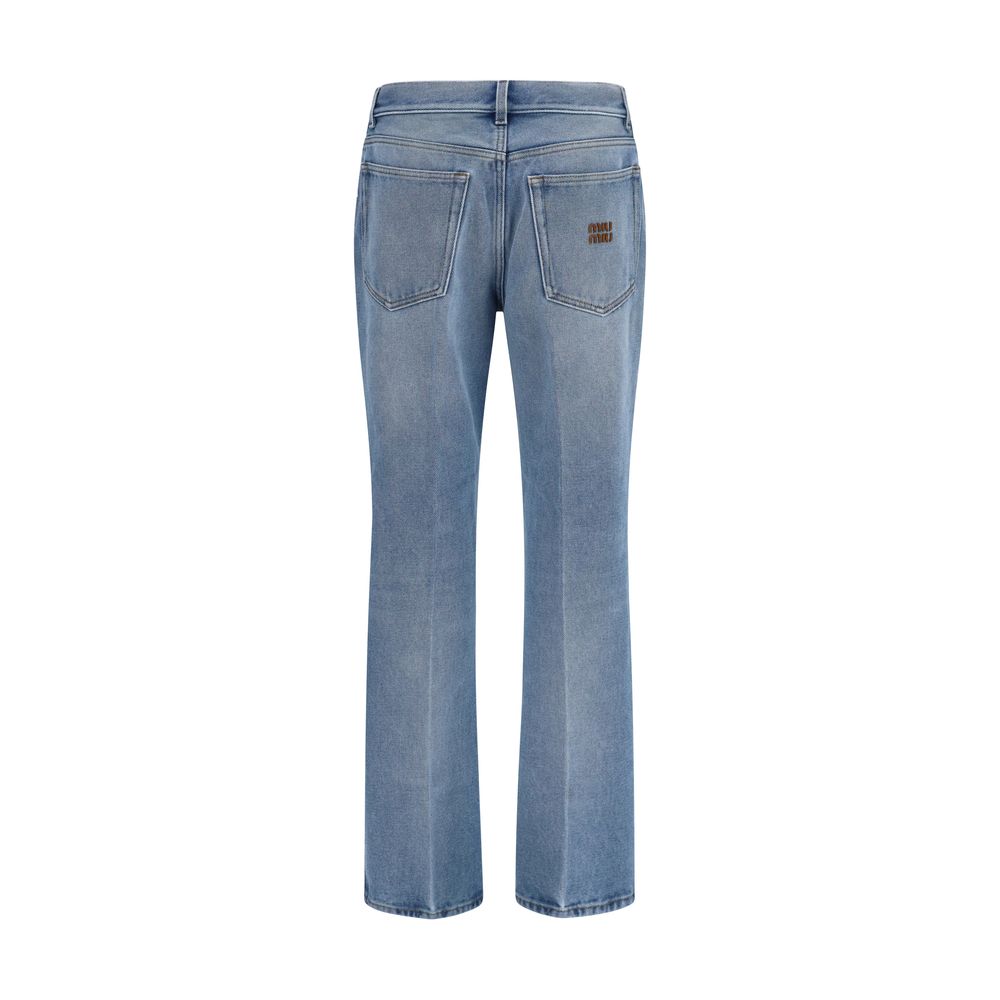 Elevate your style with Miu Miu Blue Polyester Relaxed Fit Jeans, where luxurious craftsmanship meets modern elegance, perfect for the discerning individual.