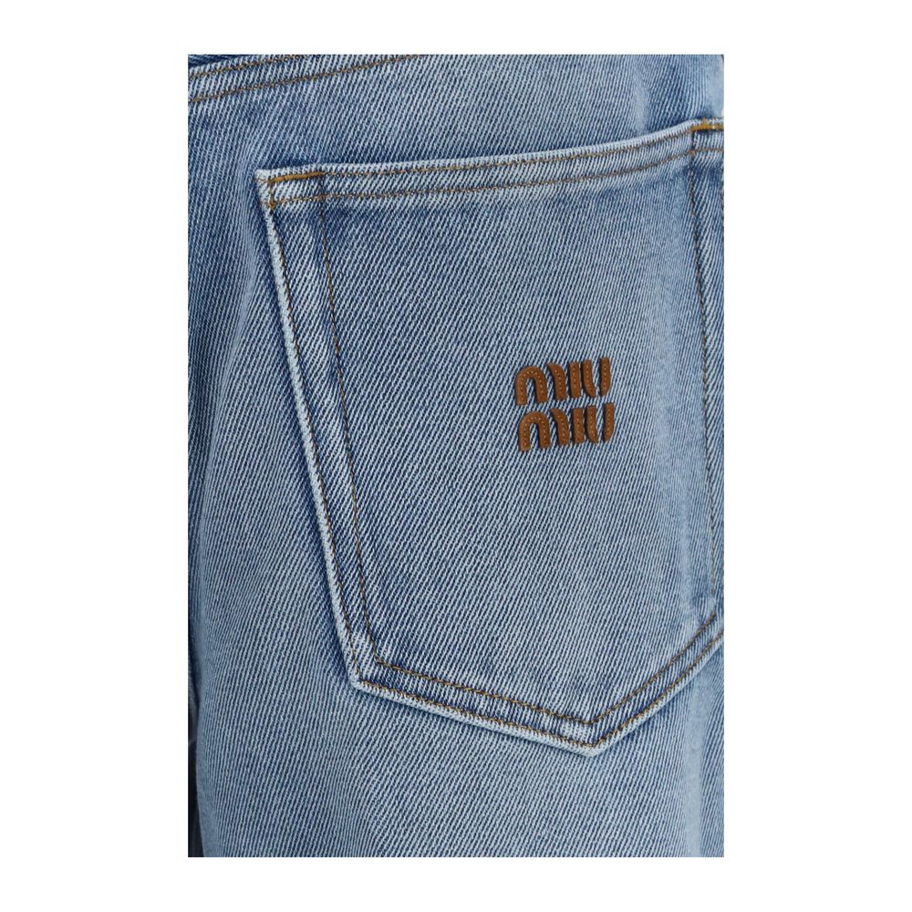 Discover the Miu Miu Blue Polyester Relaxed Fit Jeans, where luxurious denim couture meets exquisite craftsmanship, perfect for those who embody elegance and sophistication.