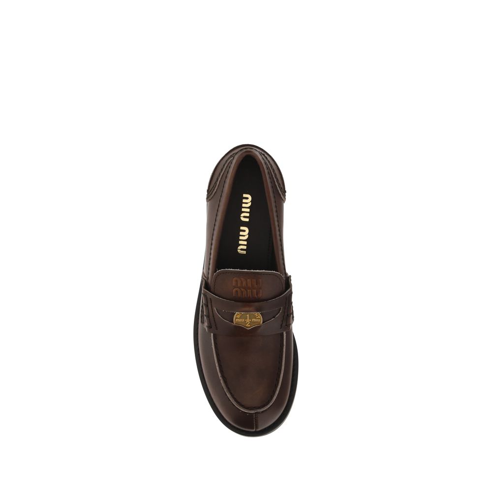 Miu Miu Brown Calf Leather Slip-On Loafers - Timeless Luxury
