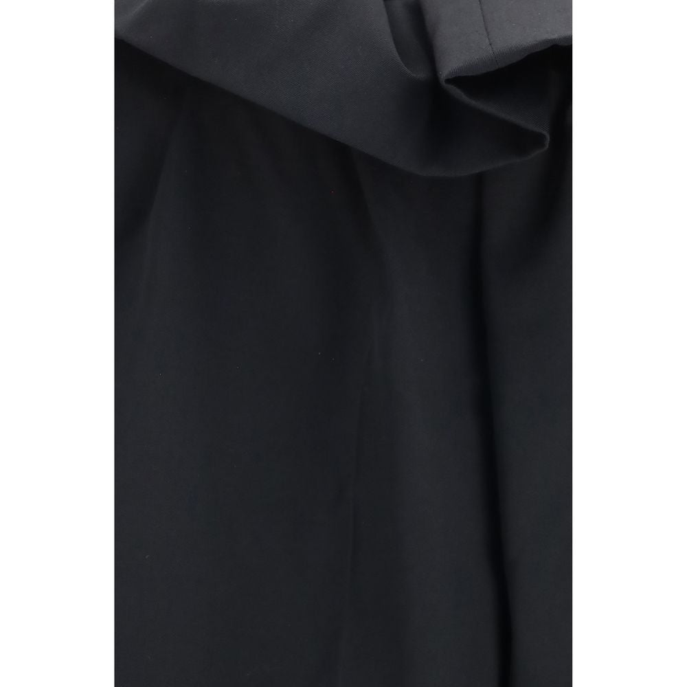 Elevate your wardrobe with Khaite Black Wool Oves Aries Casual Pants, crafted from 100% Merino Wool for unparalleled elegance and comfort, embodying modern sophistication.