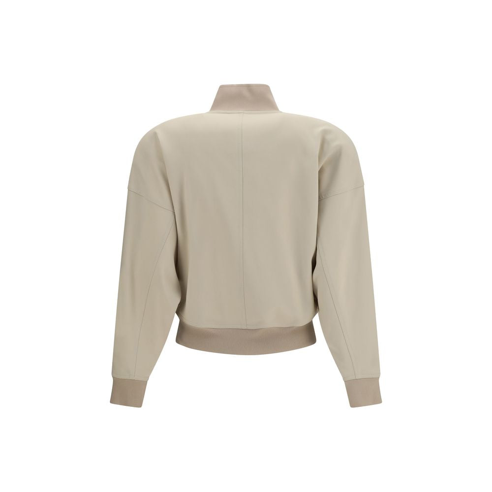 Elevate your wardrobe with the Gucci Beige Cotton Bomber, a masterpiece of contemporary design crafted from 100% cotton, embodying modern sophistication and timeless elegance.