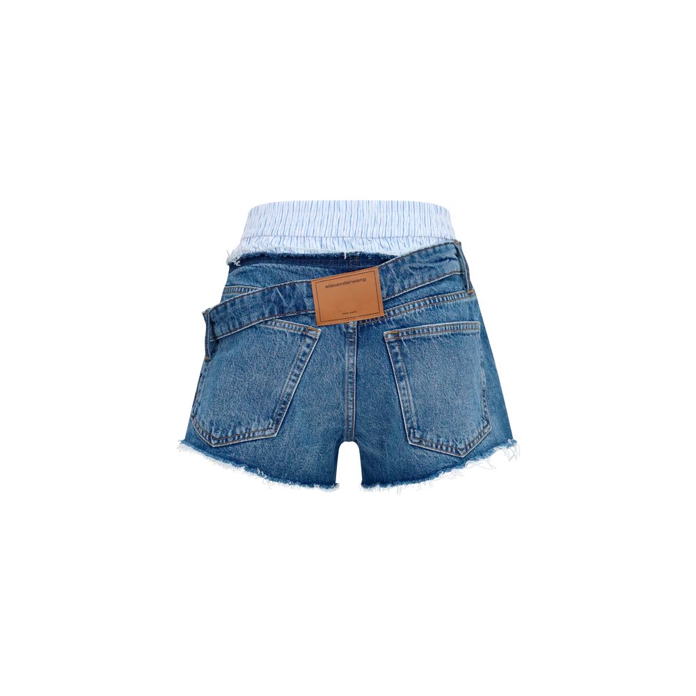 Indulge in the artistry of Alexander Wang Blue Denim Shorts, crafted from 100% cotton, where contemporary elegance meets avant-garde design for the discerning fashionista.