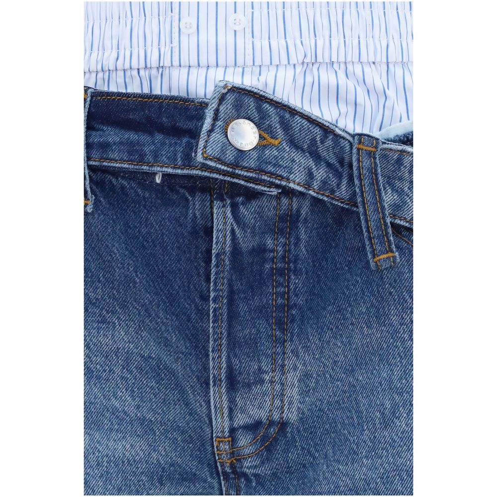 Experience the allure of Alexander Wang Blue Denim Shorts, crafted from 100% cotton with a daring layered boxer effect, embodying luxury and modern elegance.