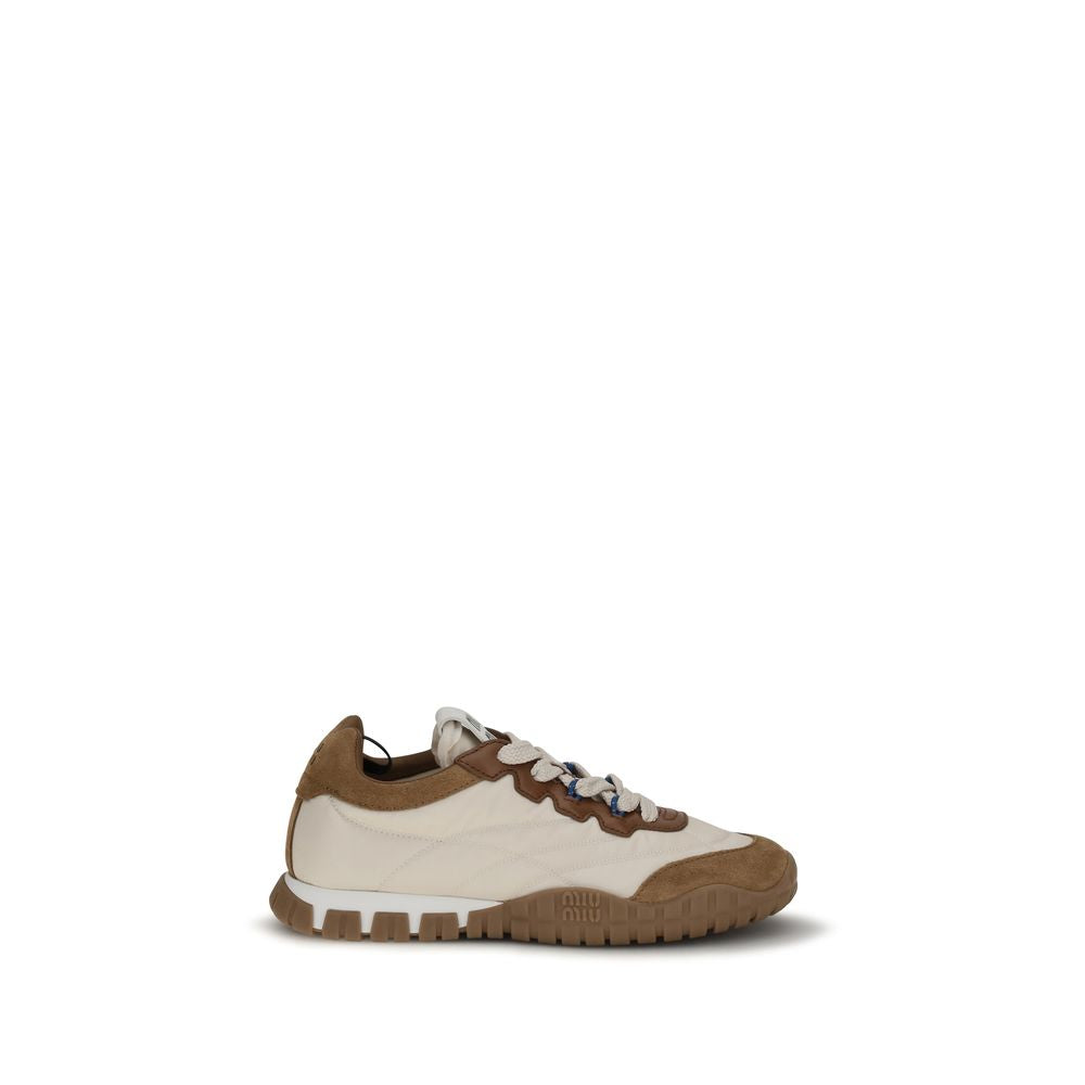 Elevate your style with Miu Miu Beige Polyamide Athletic Sneakers, where luxurious materials meet impeccable craftsmanship for a chic, sophisticated look.
