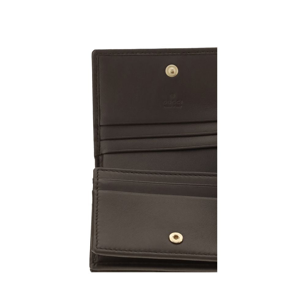 Discover the Gucci Brown Calf Leather Bos Taurus Wallet, an exquisite blend of artisanal craftsmanship and luxurious design, perfect for the discerning individual.