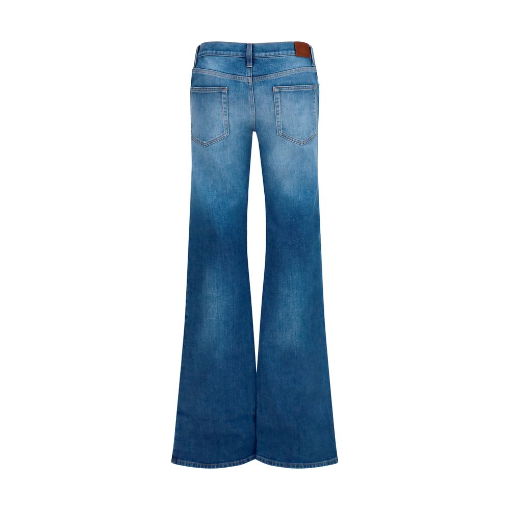 Elevate your wardrobe with Gucci Blue Cotton Flared Jeans, crafted in Italy from premium materials, embodying timeless luxury and sophisticated style for the discerning individual.