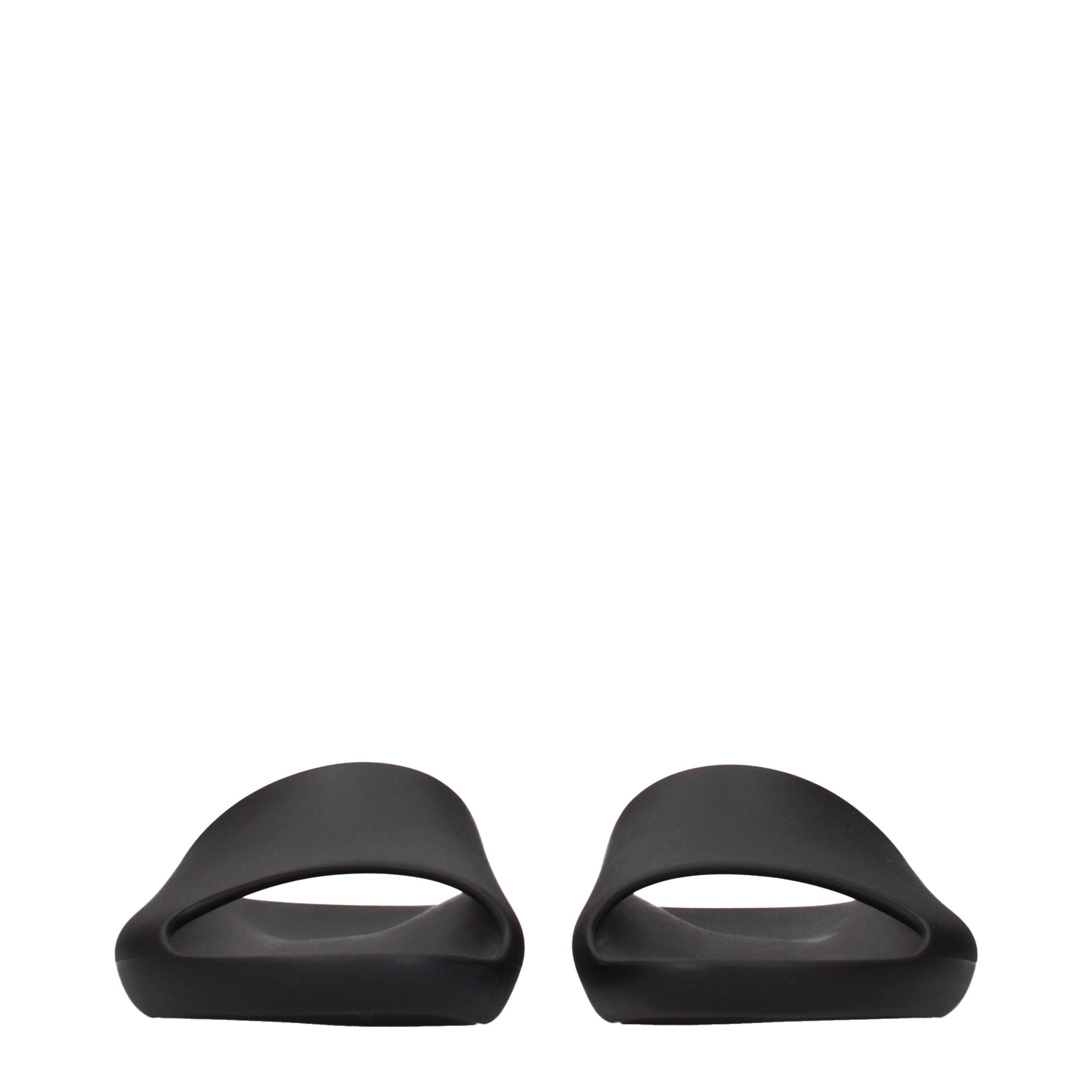 Experience the exquisite elegance of The Row Black Cotton Slippers, where luxurious craftsmanship meets timeless design, perfect for elevating your everyday moments.