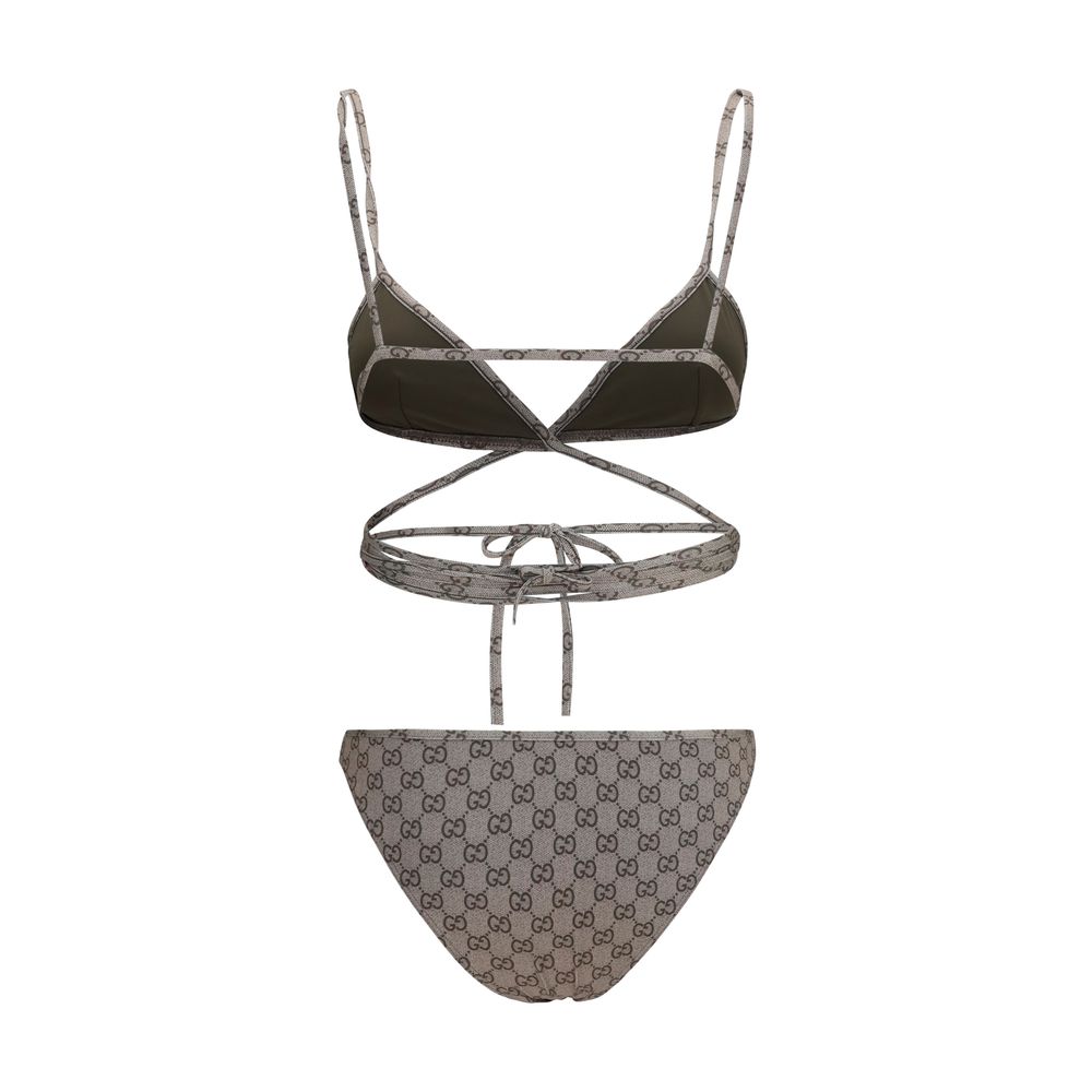 Experience the allure of the Gucci Beige Polyester Bikini, a luxurious blend of comfort and sophistication, perfect for sun-soaked escapes and elegant lounging.