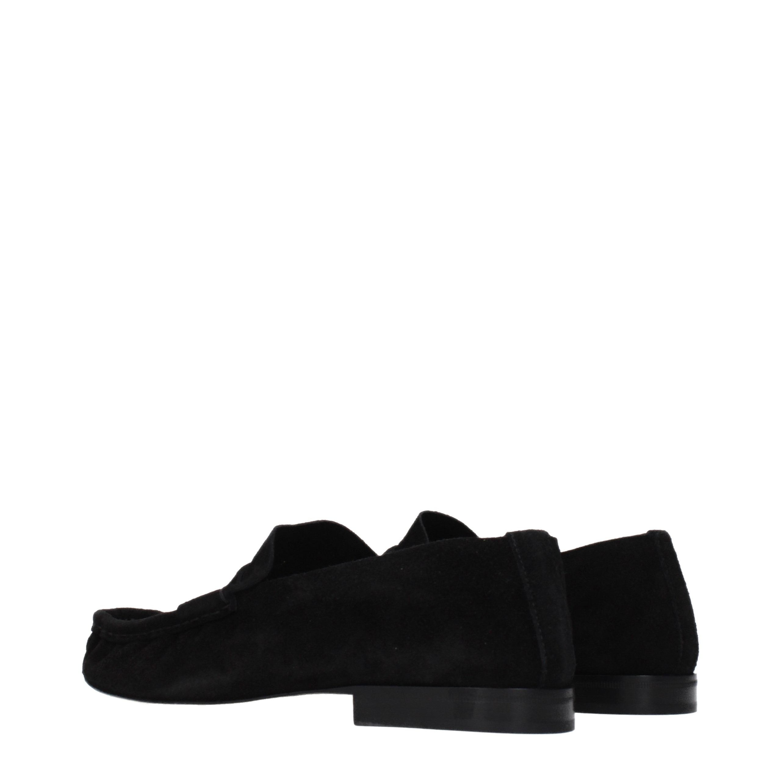 Experience the allure of The Row Black Leather Slip-On Loafers, where exquisite craftsmanship meets timeless elegance, perfect for the discerning individual.