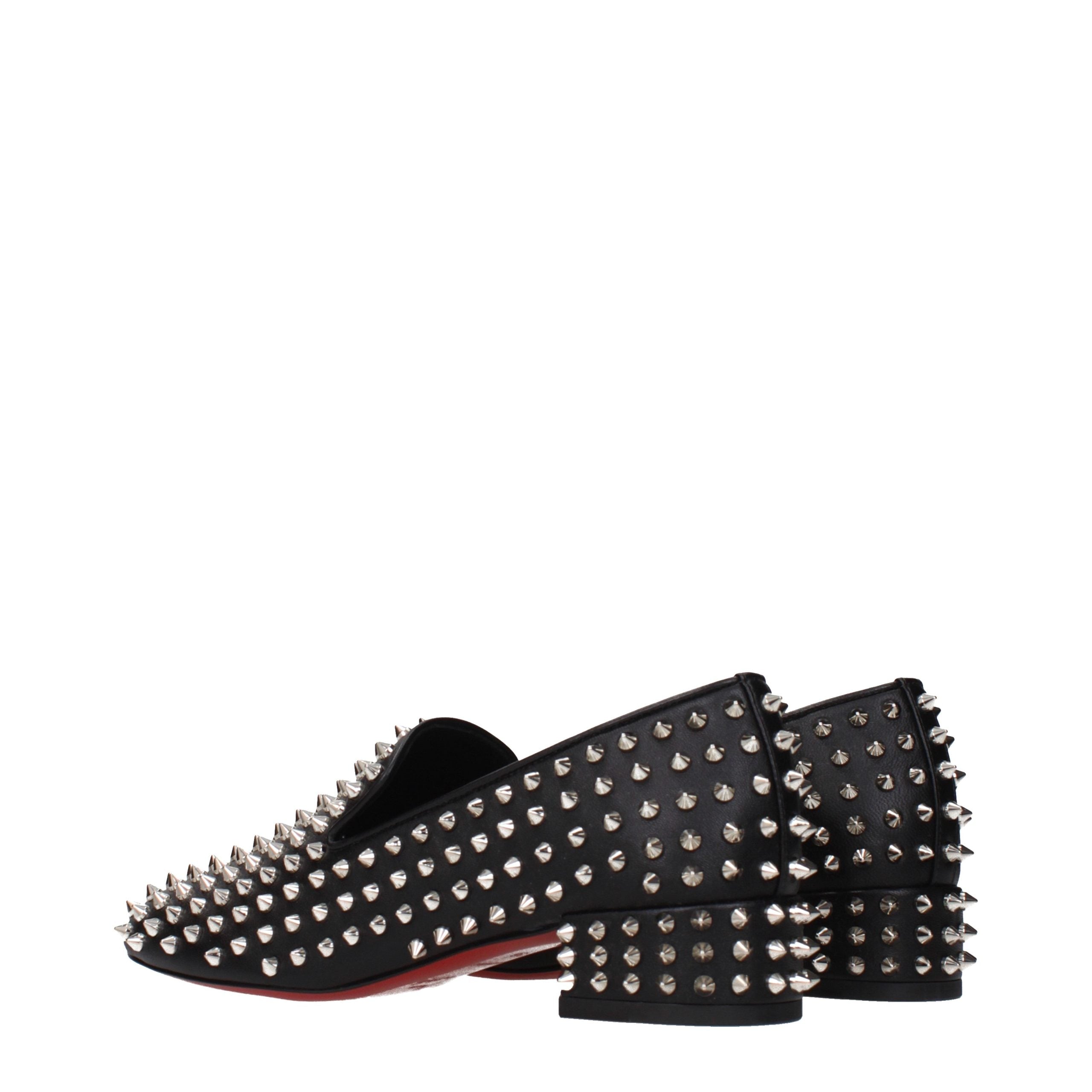Discover the allure of Christian Louboutin Black Leather Slip-On Loafers, where exquisite craftsmanship meets modern elegance, perfect for the discerning individual.